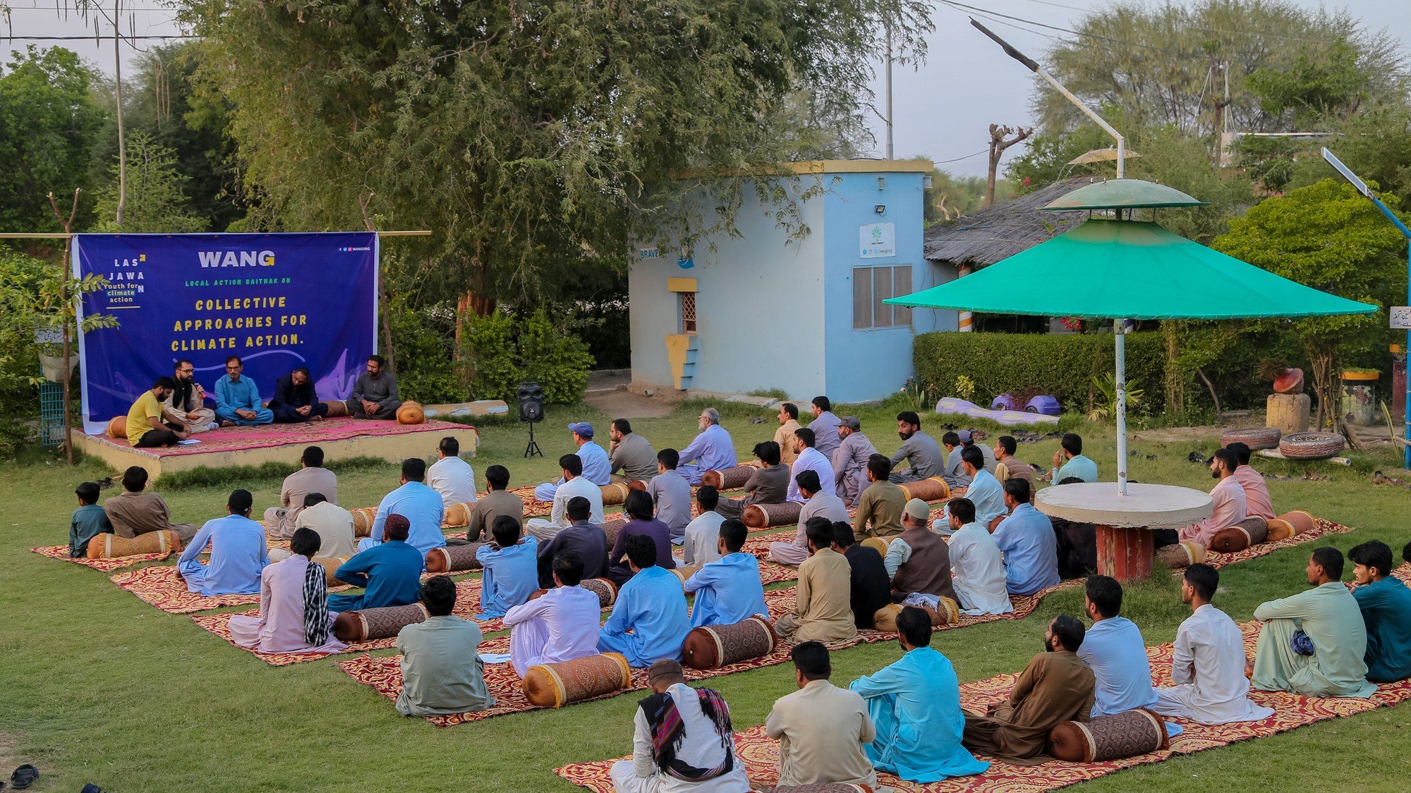 Community gathering at WANG climate action event in Lasbela, Balochistan