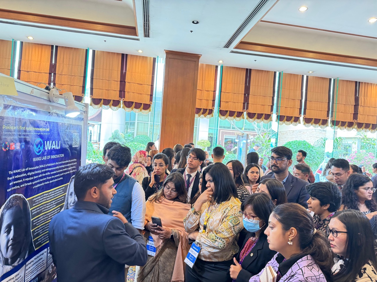 Qaisar Roonjha presenting WALI at international conference featured on InsightOnConflict