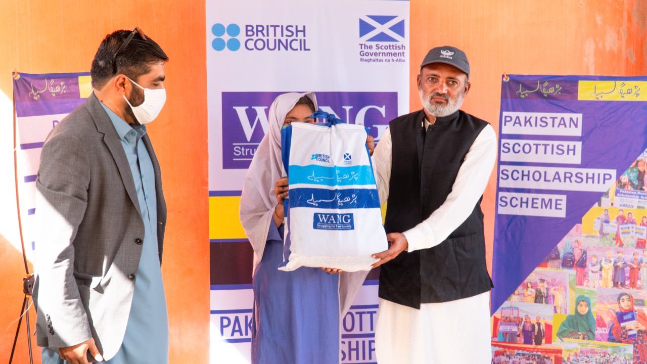 Pakistan-Scottish Scholarship Scheme distribution ceremony with British Council, Scottish Government and WANG banners